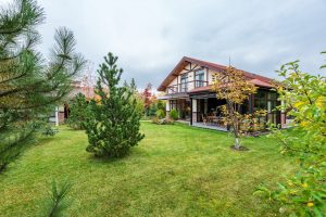 Charming suburban residence with lush greenery and a spacious yard, ideal for a tranquil lifestyle.